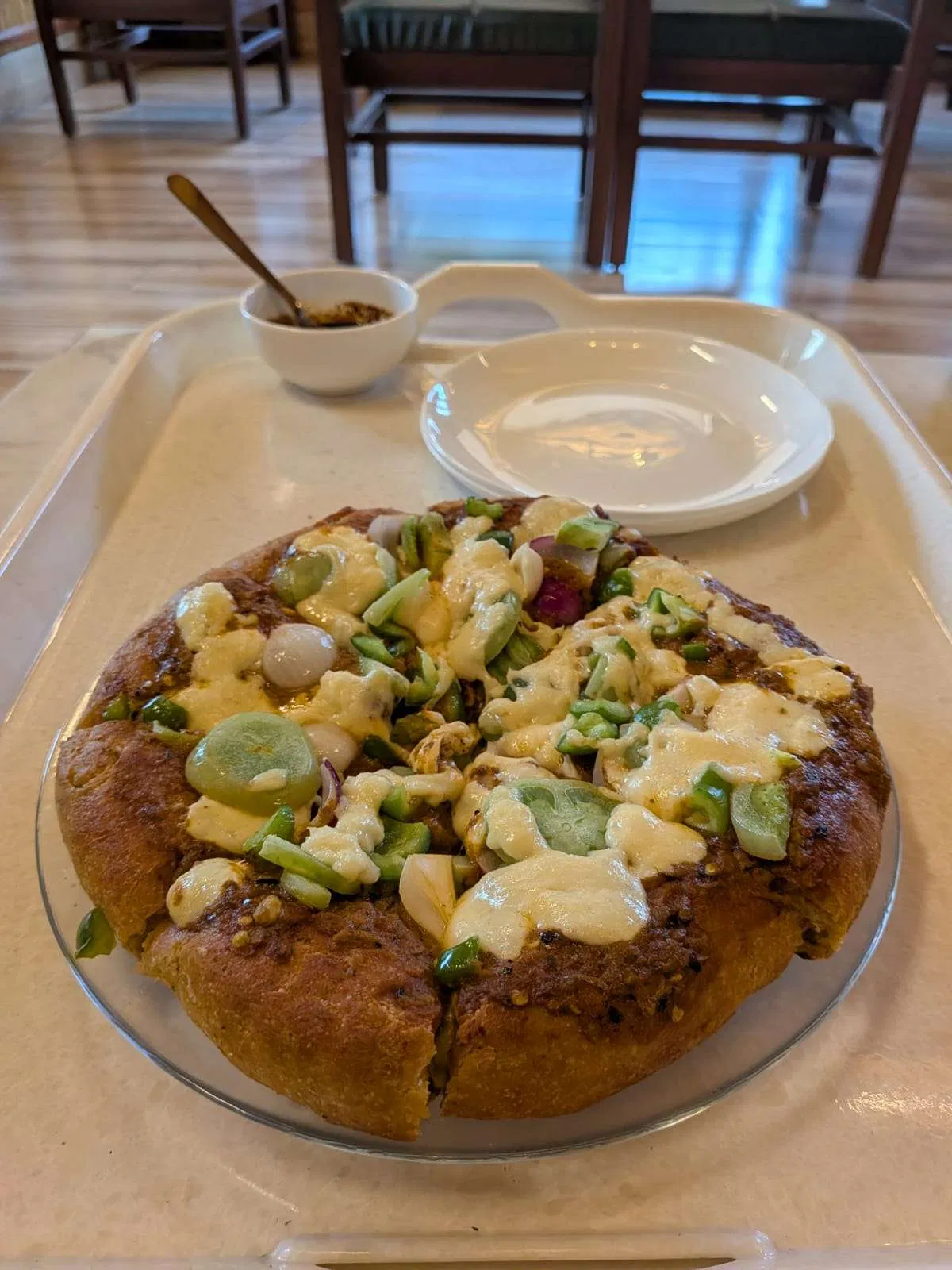 A café dish topped with vegetables